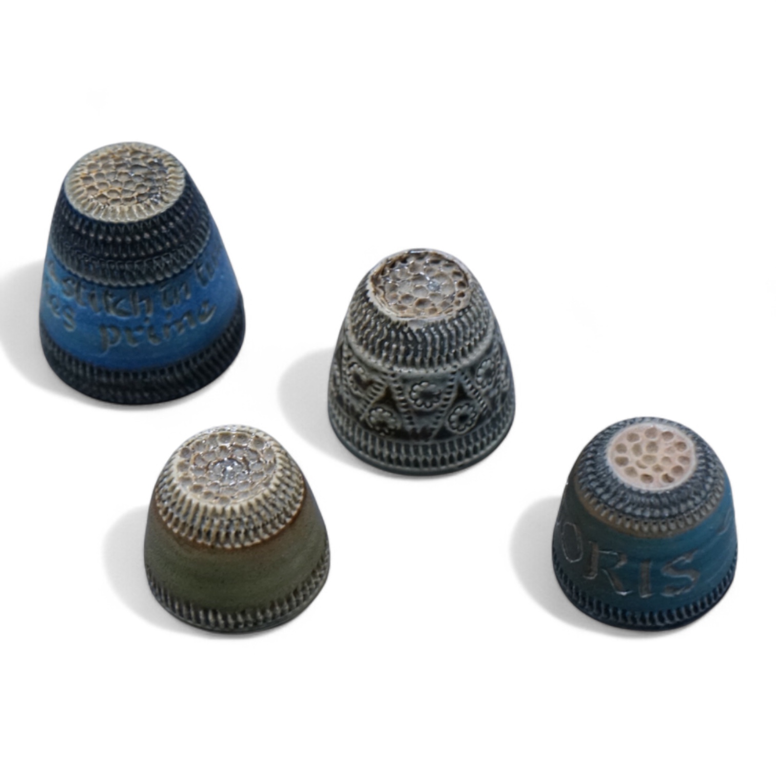 Guy Sydenham (1916-2005), four thimbles, made for the potter’s sister-in-law Doris, tallest 3cm